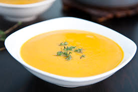 butternut squash soup in white bowl