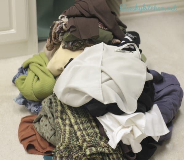 How to Declutter Your Closet ~ Madame Chic Strikes Again. Cleaning out my closet, bagging up clothes to give away and decluttering.