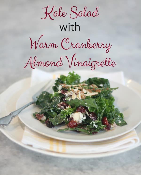 Kale Salad with Warm Cranberry Almond Vinaigrette is a perfect choice for a fireside dinner, a chilly Sunday afternoon or a fall first~course celebration.