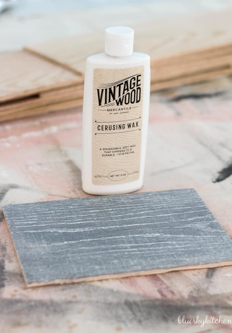 How to Create a Weathered Wood Backsplash. Palette Wall in a Box and Amy Howard at Home products created a weathered looking wall as a backsplash.
