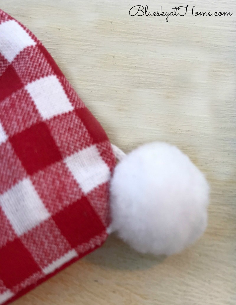 sewing napkins with pom-poms