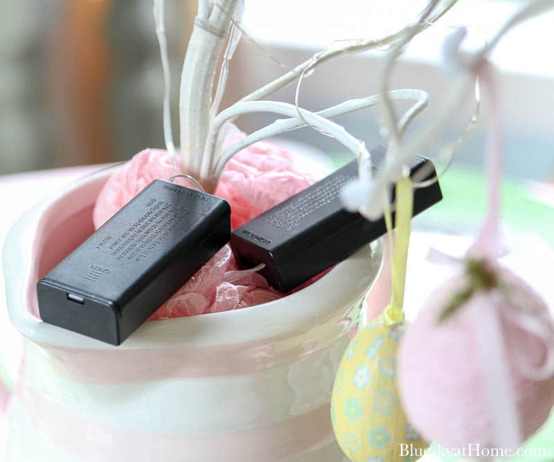 batteries on pink and white pitcher