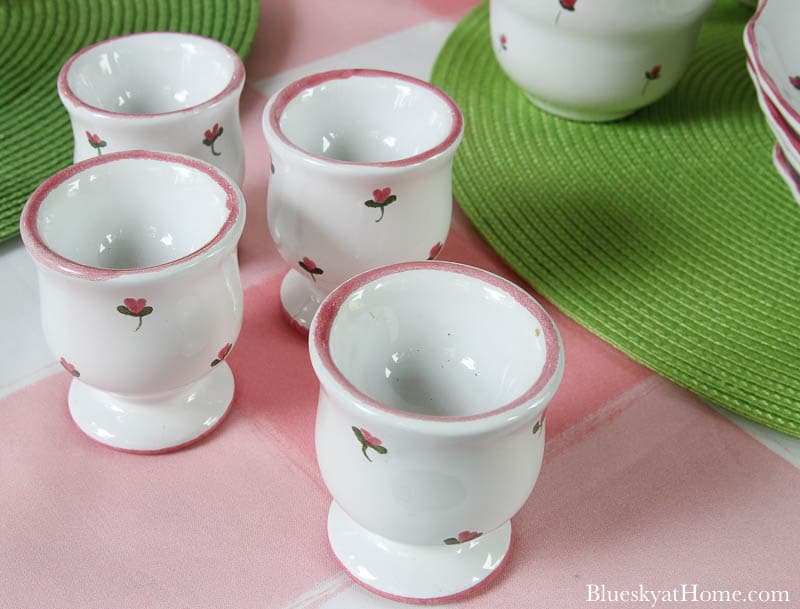 4 egg cups with pink flowers
