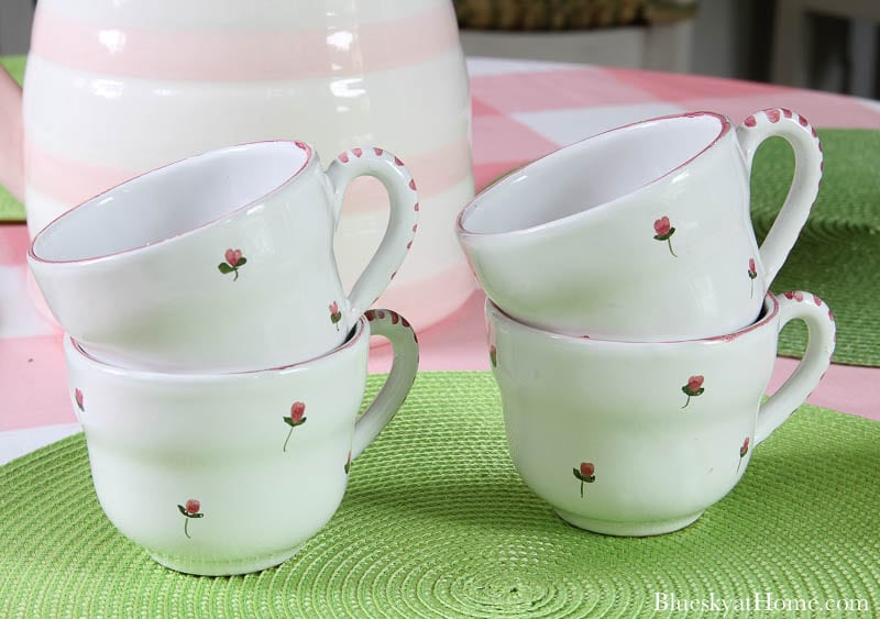 4 cups with pink flowers