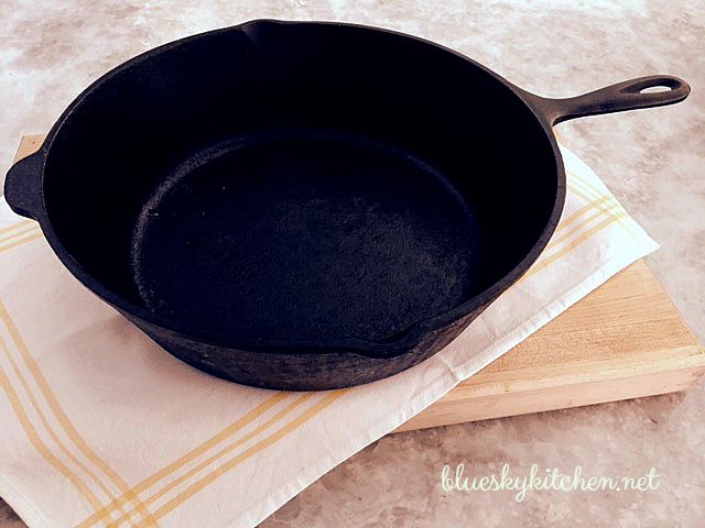 Add a tiny amount of mild dish detergent ONLY if you think the skillet is really greasy.