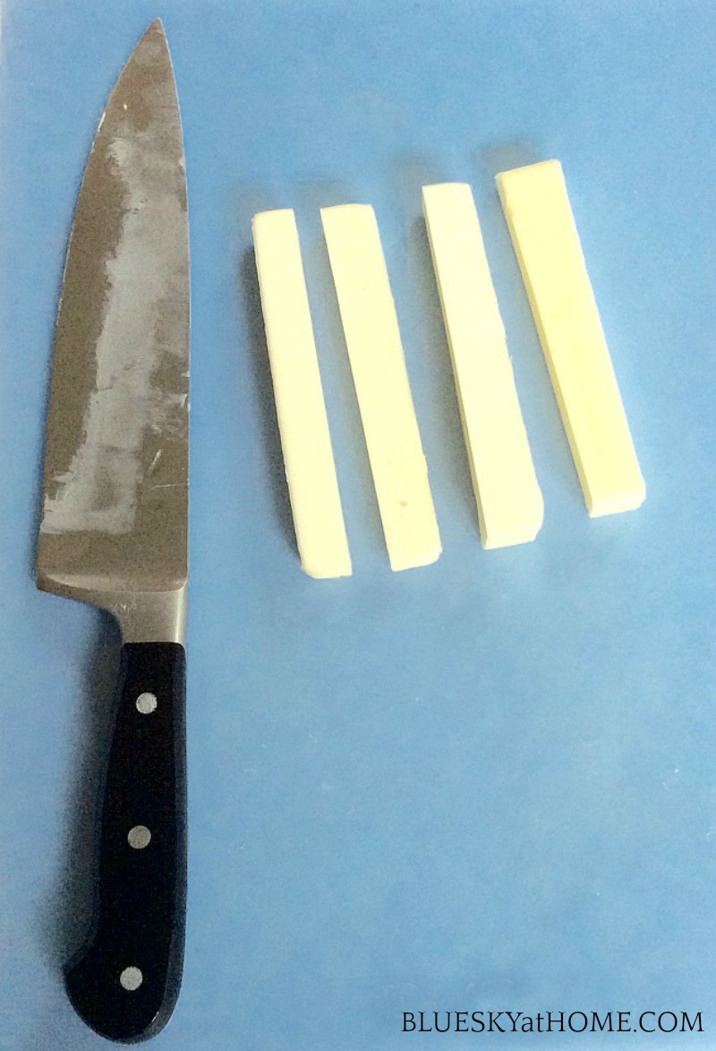 sticks of butter and knife