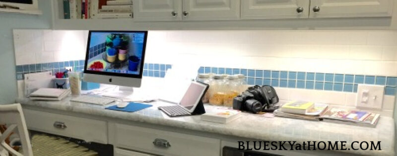 cluttered kitchen desk