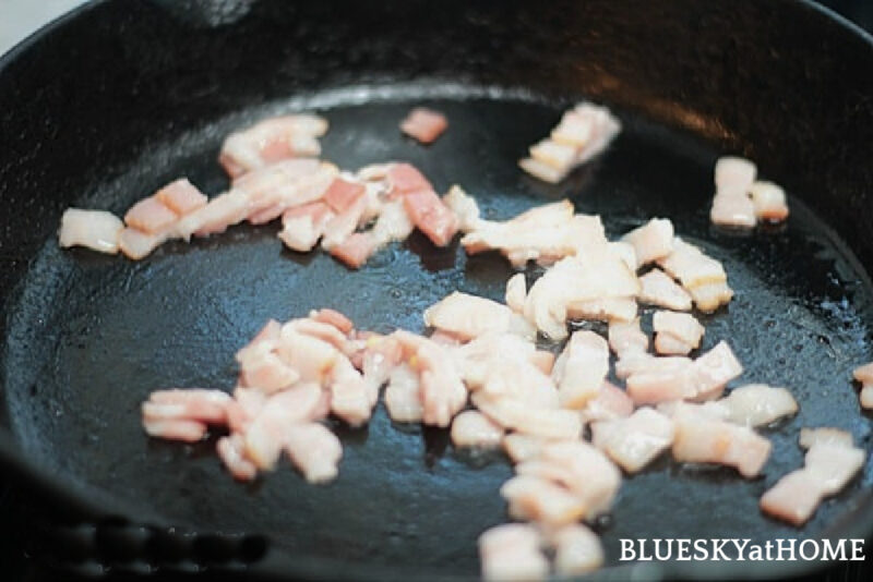 frying bacon in skillet