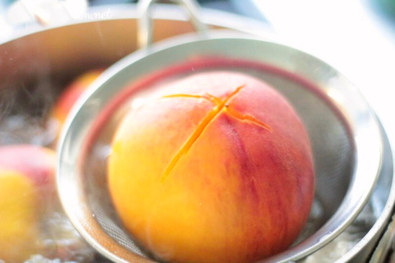 peach in sieve