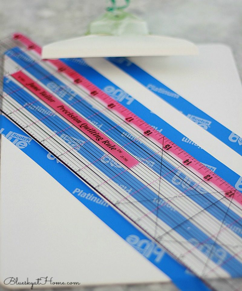 cutting strips of painters tape