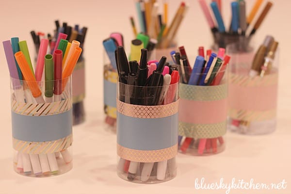 How to Make the Cutest Pen Holders with Washi Tape; an easy, quick and inexpensive DIY project to add pizazz to any any office area.