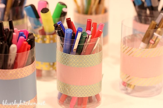 How to Make the Cutest Pen Holders with Washi Tape; an easy, quick and inexpensive DIY project to add pizazz to any any office area.