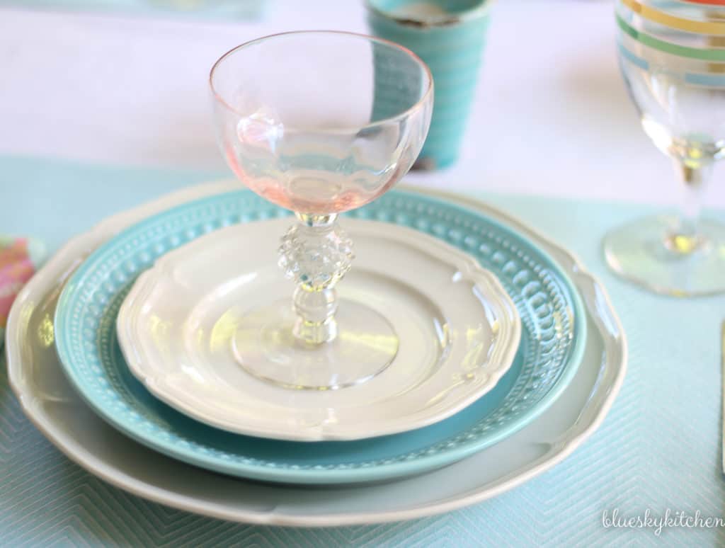 How to Create a Spring Tablescape with Bright Pastels. Using some of the happiest colors as the inspiration for a springtime table.