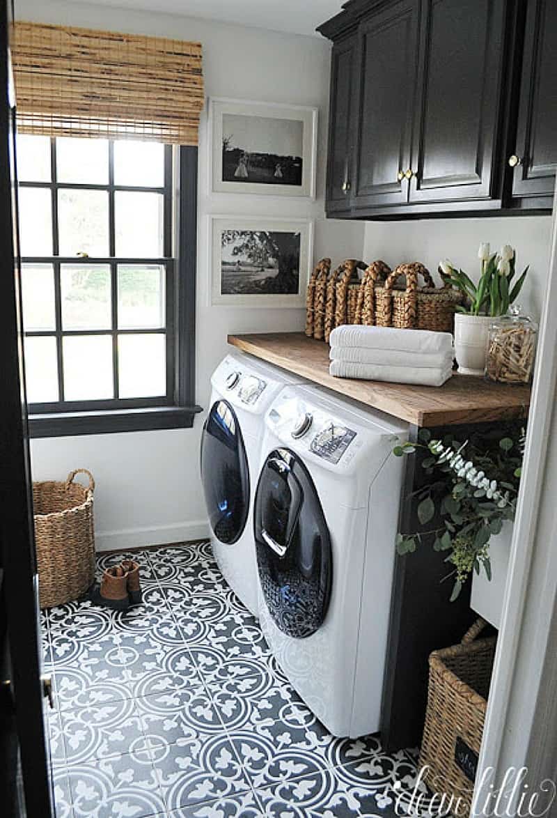 laundry room with wood counter and cabinets