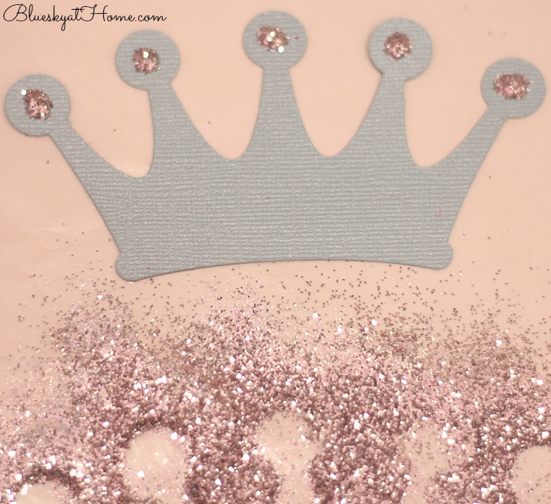 blue paper crown and glitter