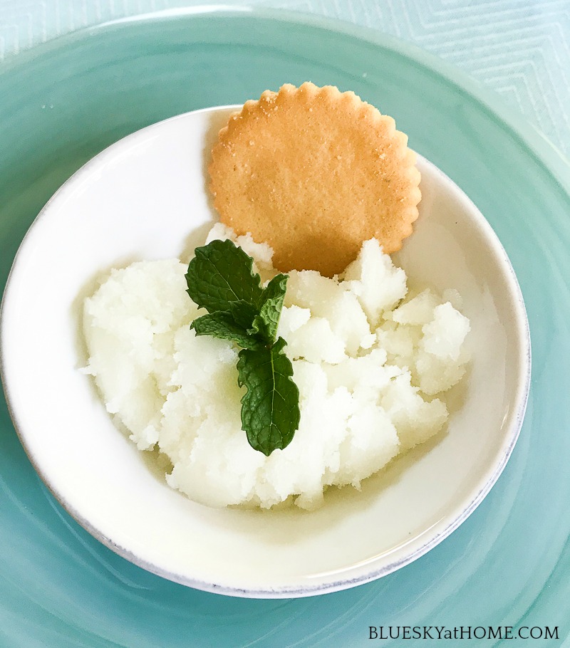 white sherbet with mint in white bowl