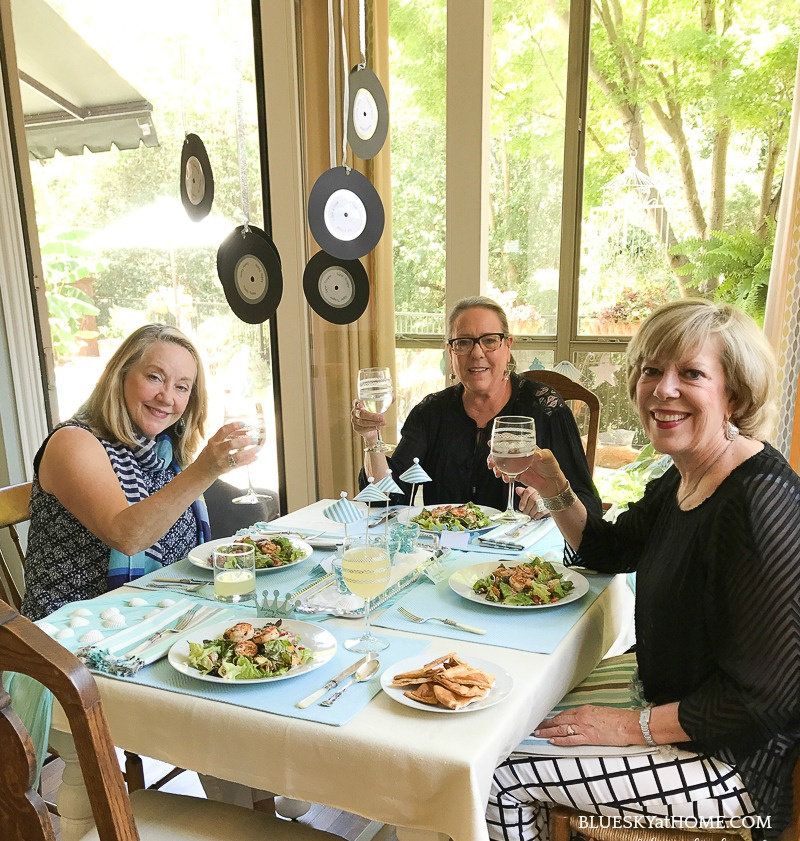 three ladies around table