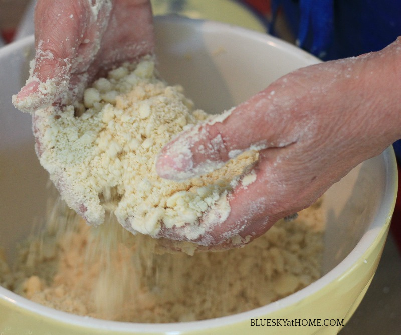 tossing flour with butter