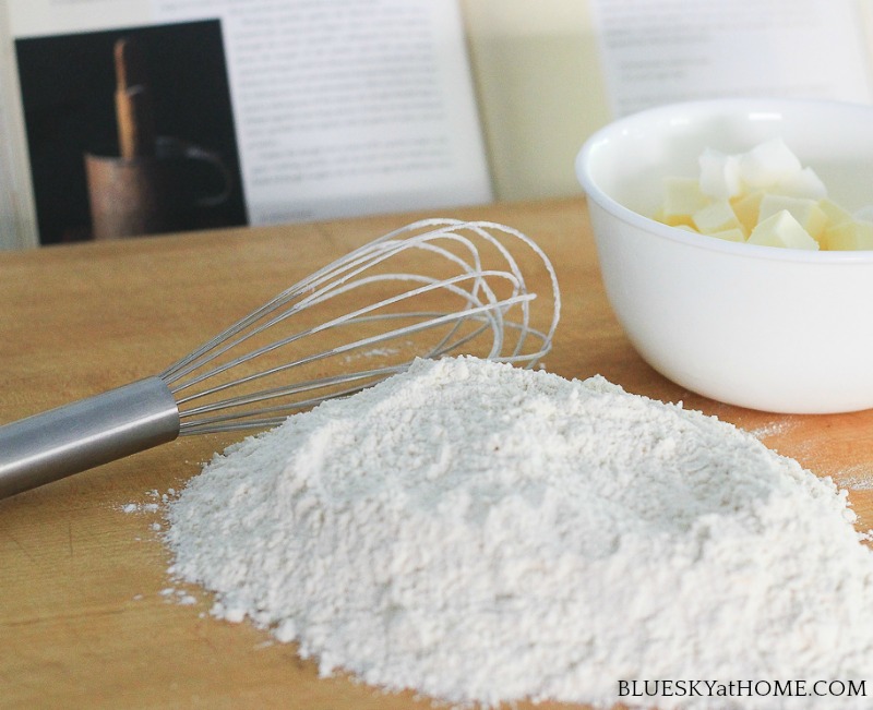 flour and whisk on counter