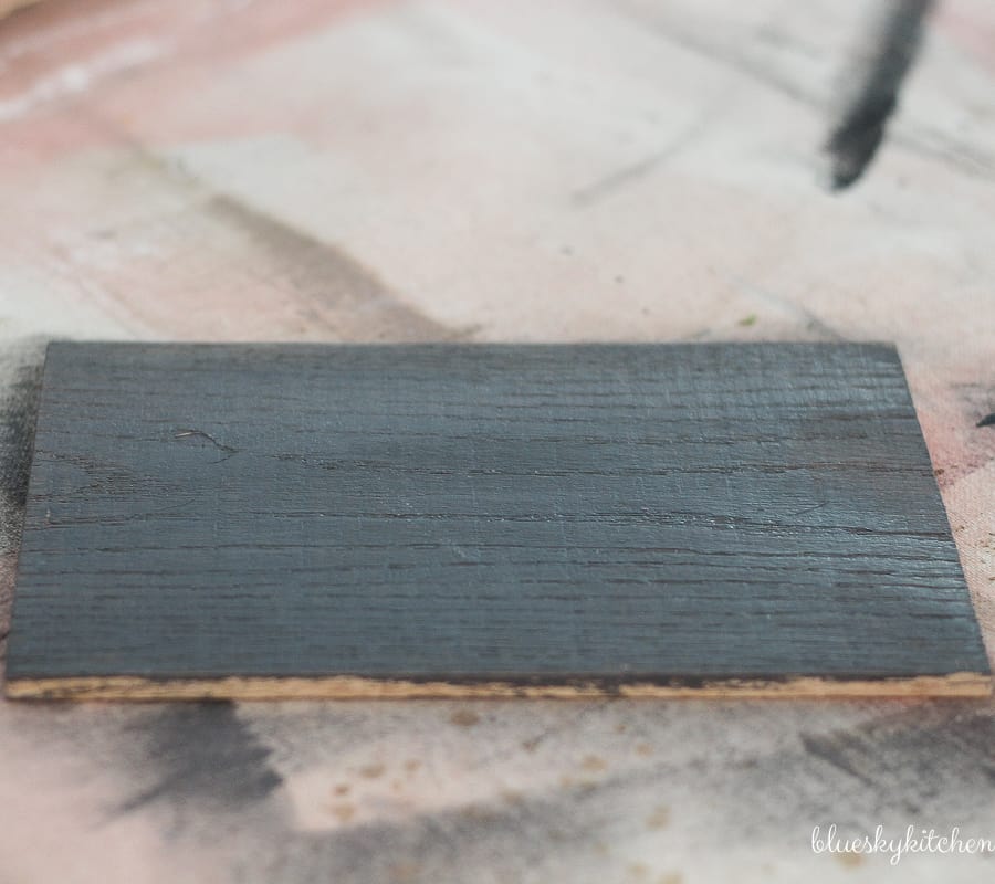 How to Create a Weathered Wood Backsplash. Palette Wall in a Box and Amy Howard at Home products created a weathered looking wall as a backsplash.