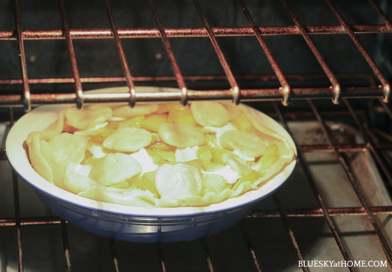 peach cobbler in oven