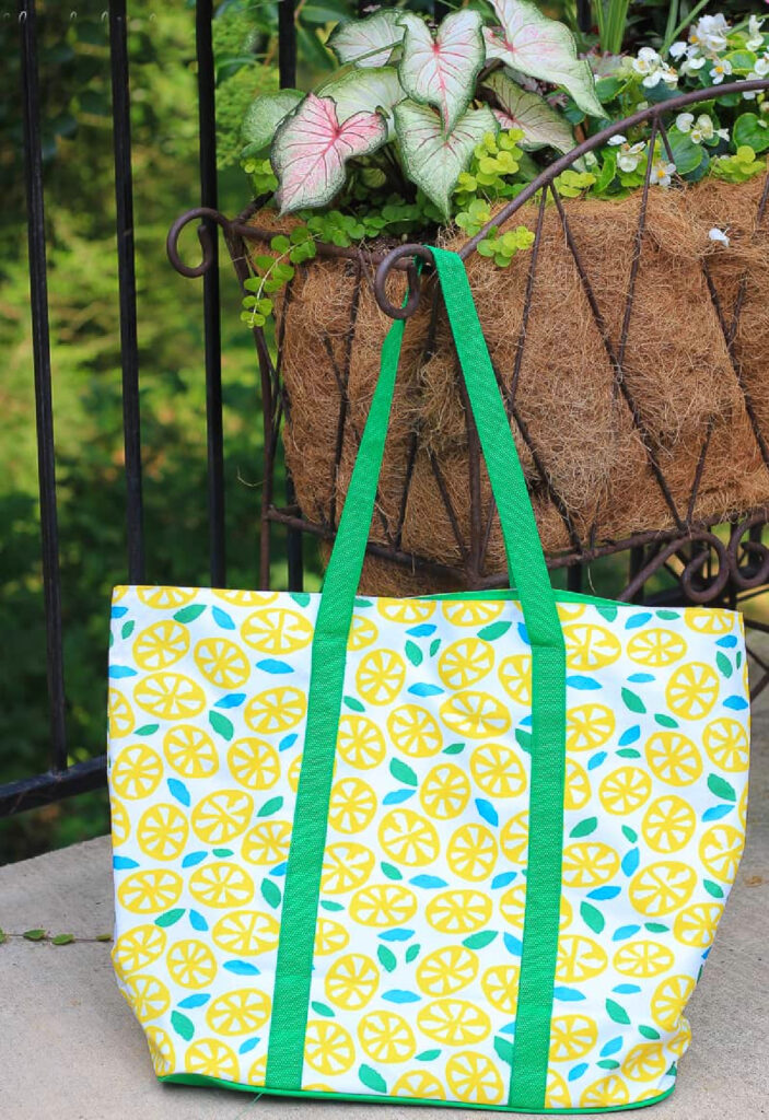 lemon design tote bag hanging on outdoor planter