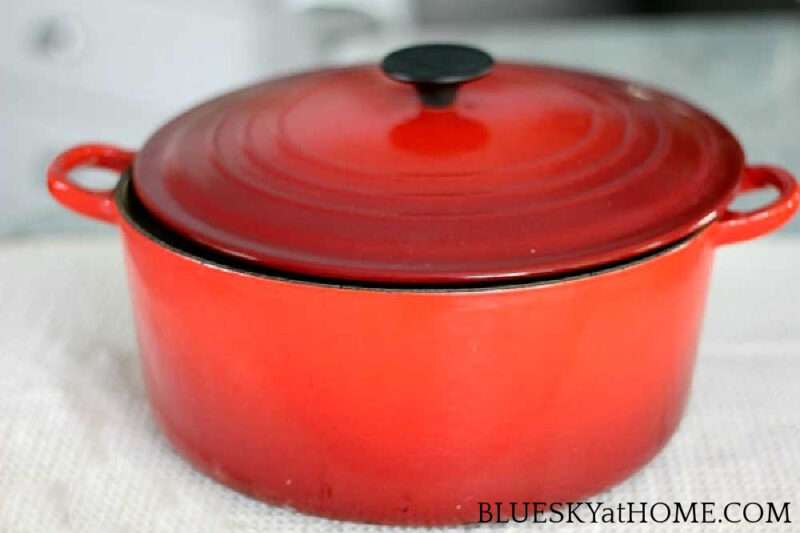 red Dutch oven for making soup