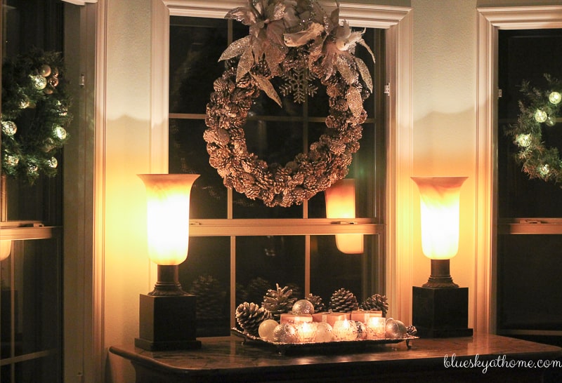 Santas and Reindeer Shine in Christmas Tablescape 2017. Green, gold, silver and white create a soft silhouette for holiday characters. BlueskyatHome.com