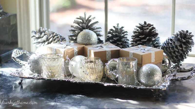 Santas and Reindeer Shine in Christmas Tablescape 2017. Green, gold, silver and white create a soft silhouette for holiday characters. BlueskyatHome.com