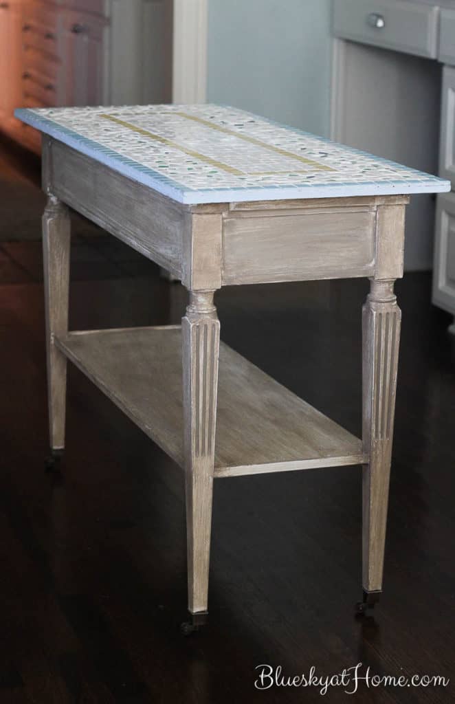 How to Turn a Console Table into a Kitchen Island. This vintage console table will get an update to turn it into a functional kitchen island. I have to decide how I want it to look when finished. So many design options require some input. BlueskyatHome.com