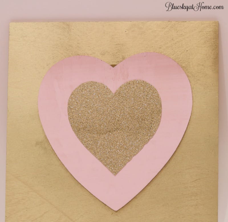3 Easy DIY Valentine Decorations under $10. These super cute DIY projects are made from the same supplies but look completely different. Make your Valentine's Day special with a front door sign to welcome guests, a heart garland for a fun touch, and handing flowers. BlueskyatHome.com