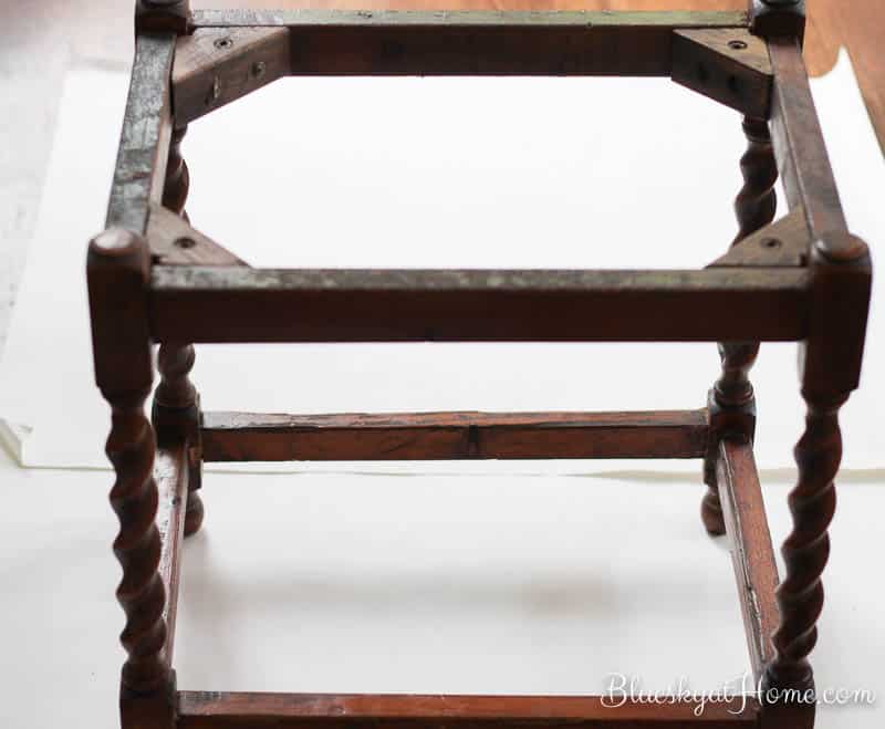 How to Repurpose a Vintage Stool ~ from Wobbly to Wow. Don't give up on that old vintage piece. Our little stool gets a new life with wood glue, wood corners and a new pretty fabric seat. BlueskyatHome.com