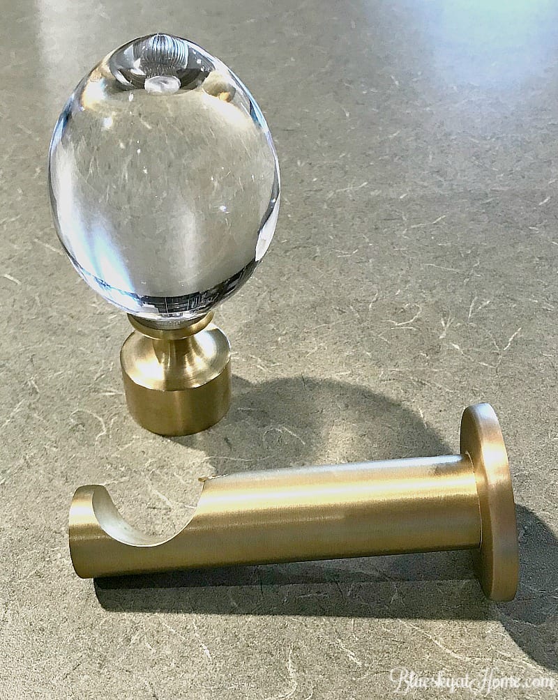 Brushed gold drapery hardware with lucite finial