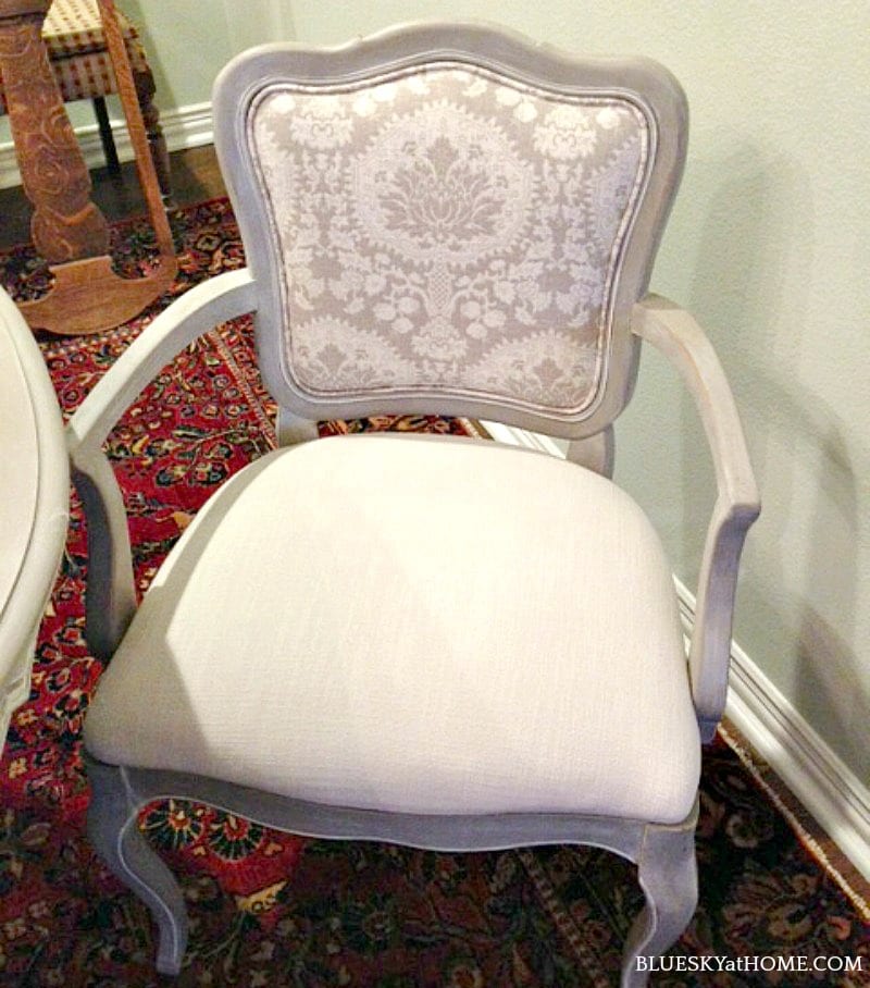 dining room chair in cream fabric and grey wood