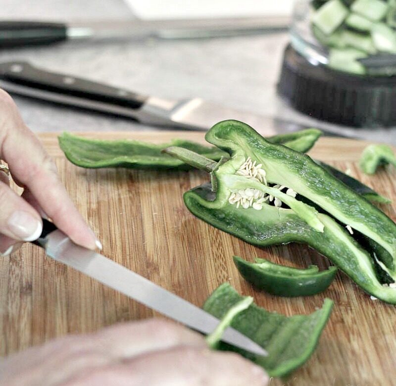 slicing poblano pepper for making Cucumber Tomatillo Gazpacho