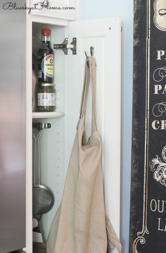 apron hanging on pantry door