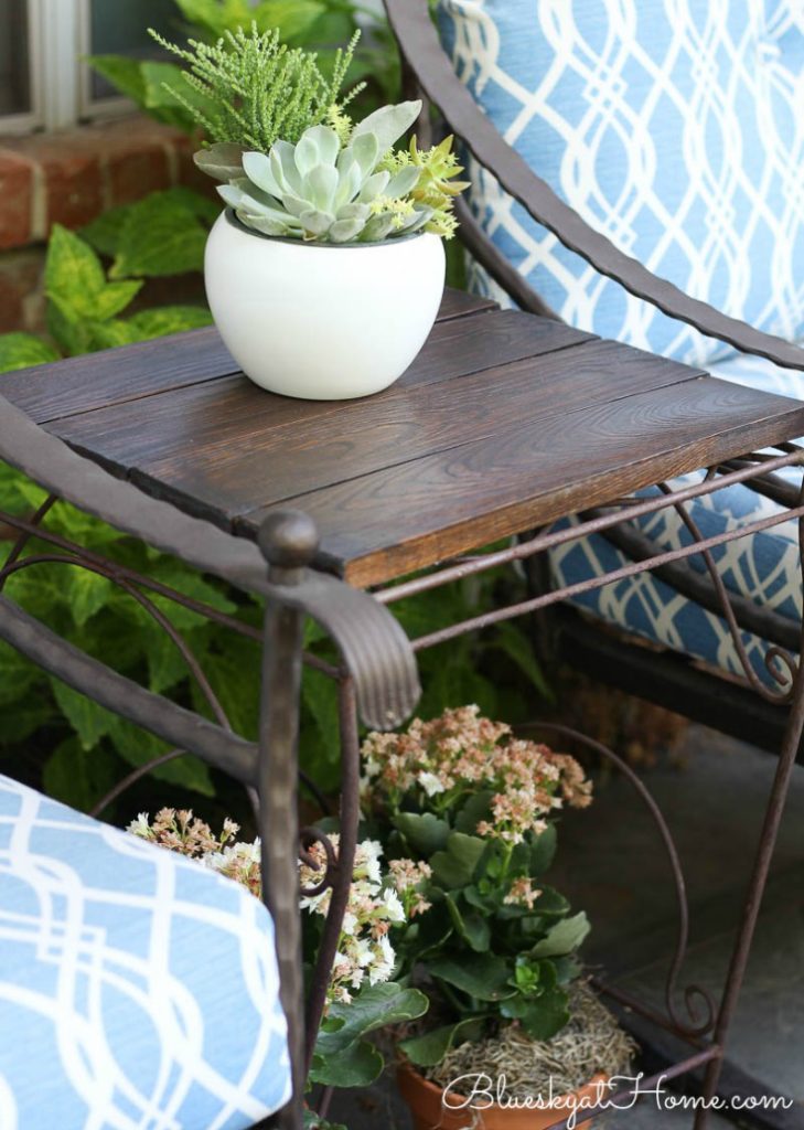 stained table top with plant