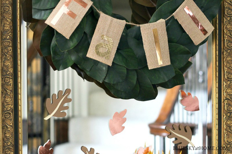 fall burlap banner on magnolia wreath