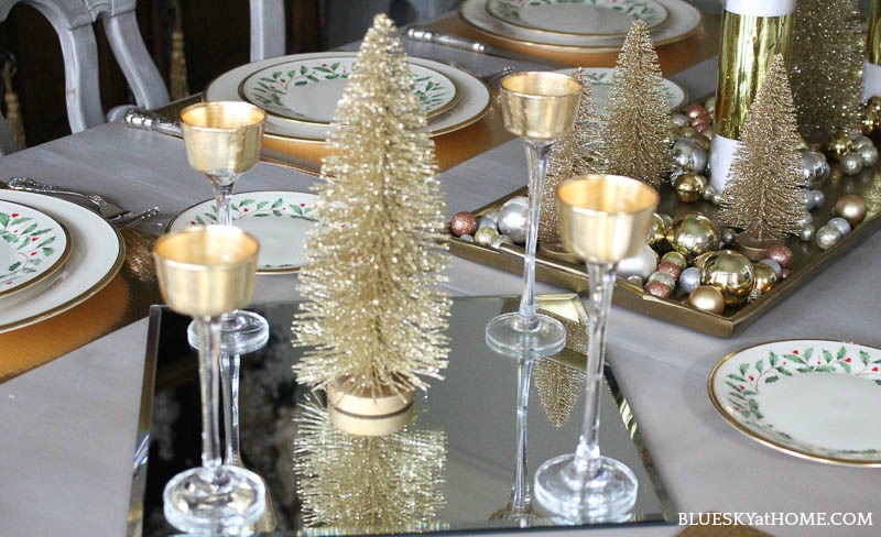 gold bottle brush trees on Christmas tablescape