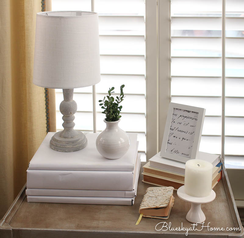 reading table with winter vignette