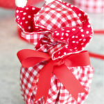 Valentine's gift wrapped in red plaid napkin