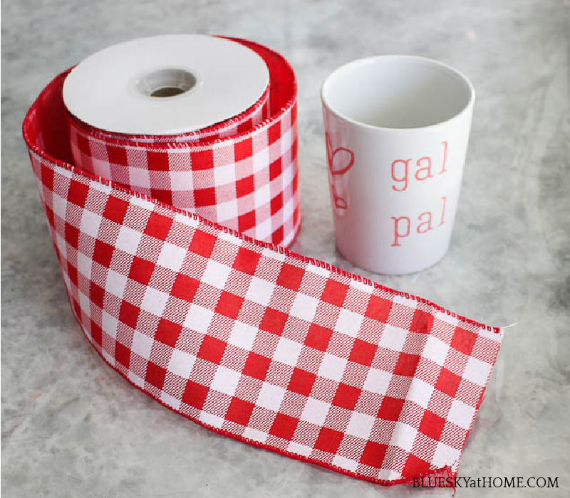 red plaid ribbon and white mug