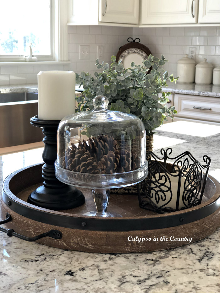 pinecones in cake stand