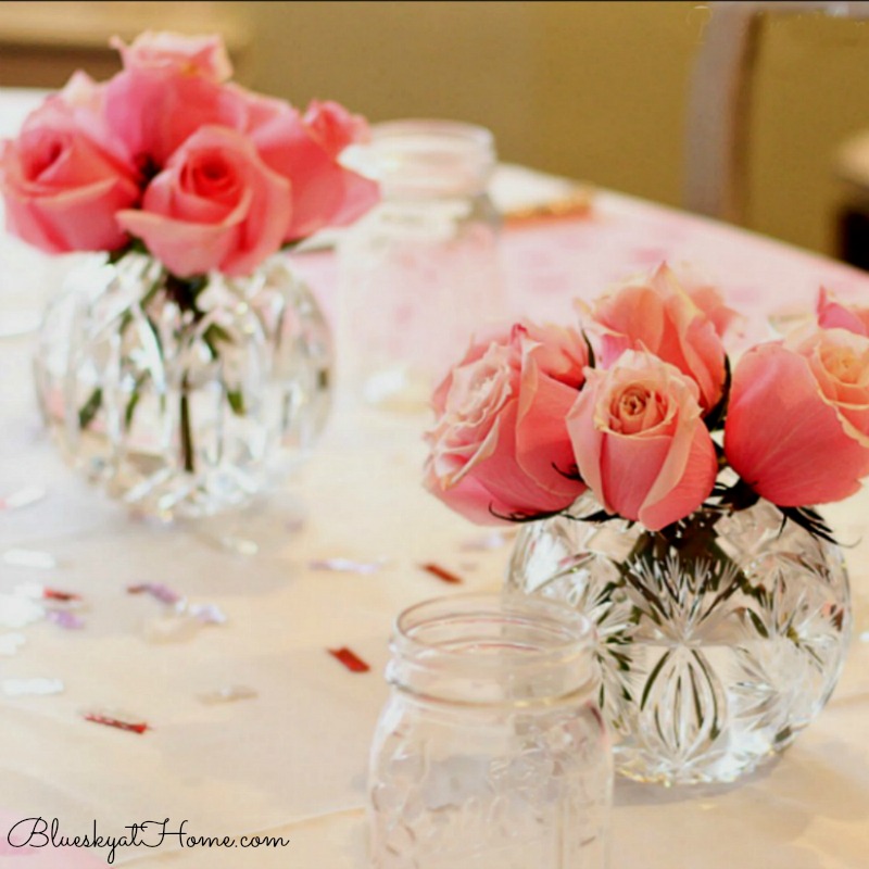 Pink roses in rose bowls