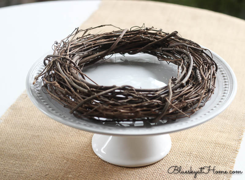 cake stand with twig wreath