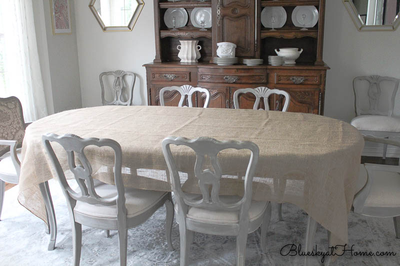 dining room table with burlap tablecloth