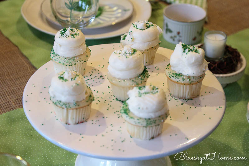 vanilla cupcakes with green sprinkles