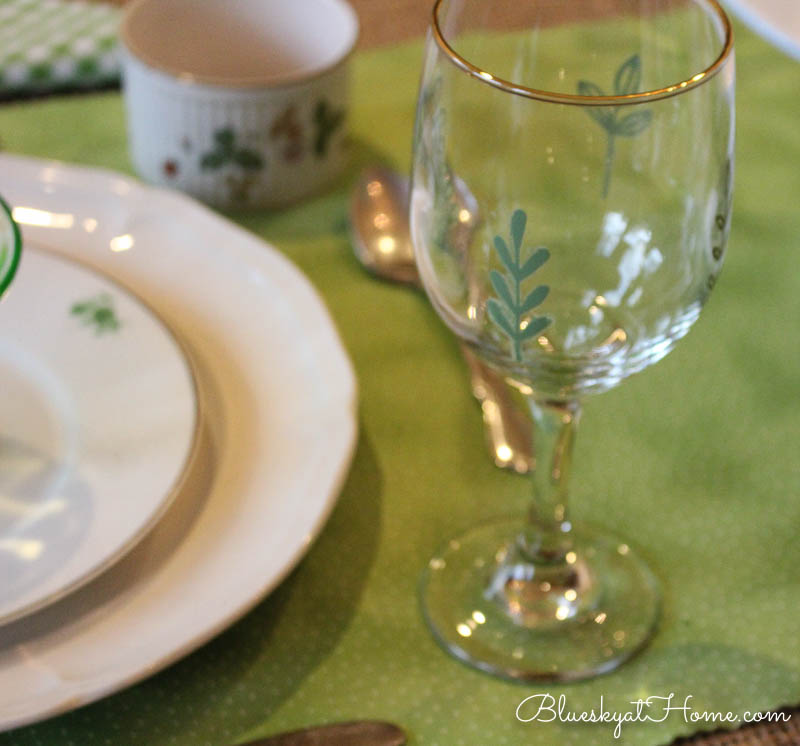 wine glass with green leaf design