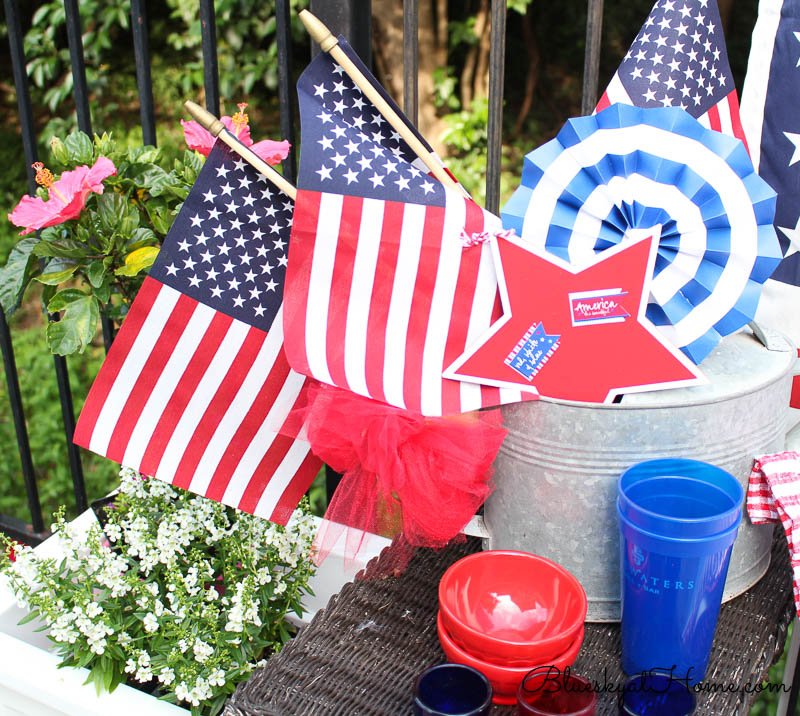 4th of July vignette with flags and pinwhells