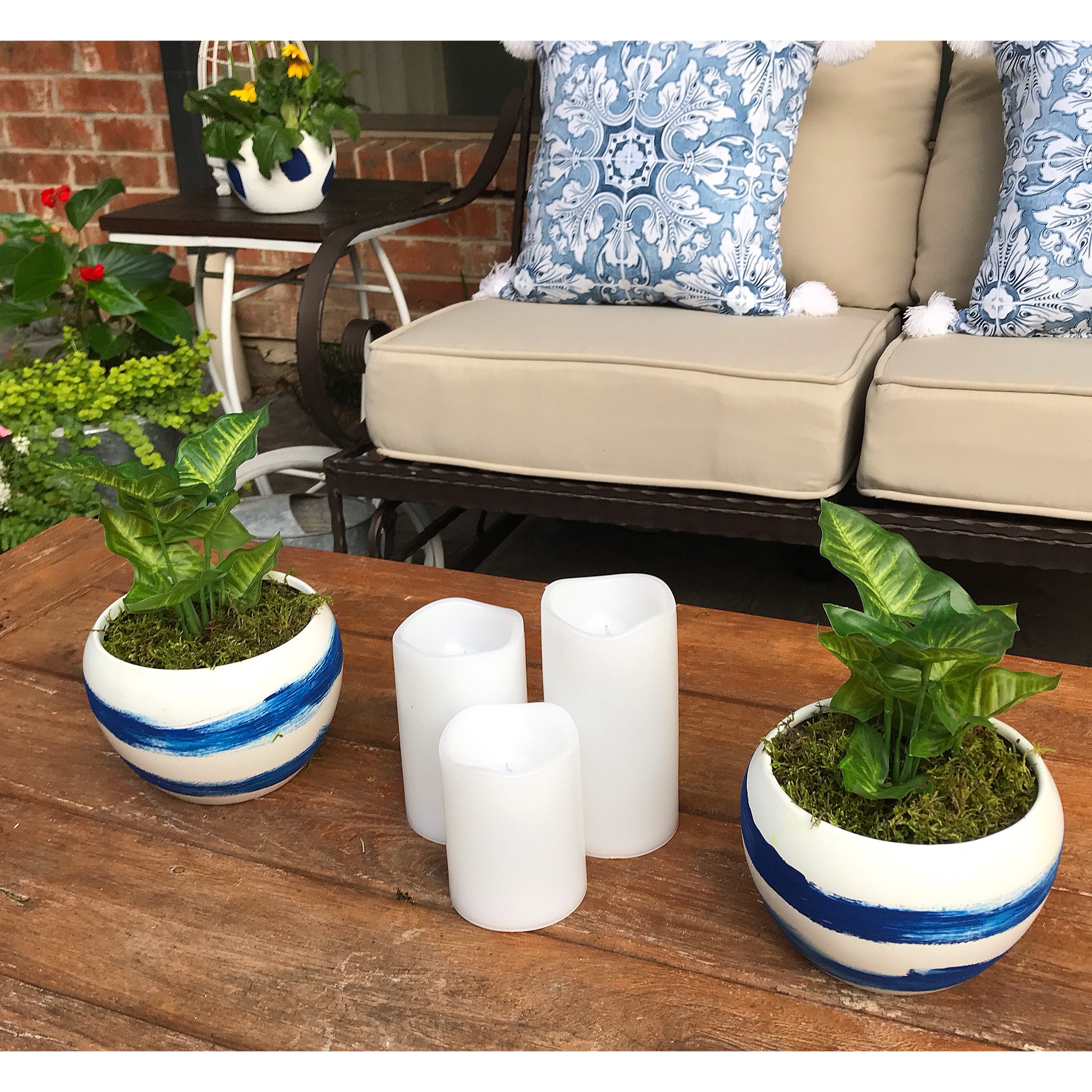 Candles and blue and white pots